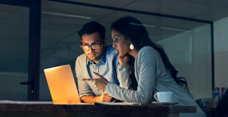 Colleagues working late in an office